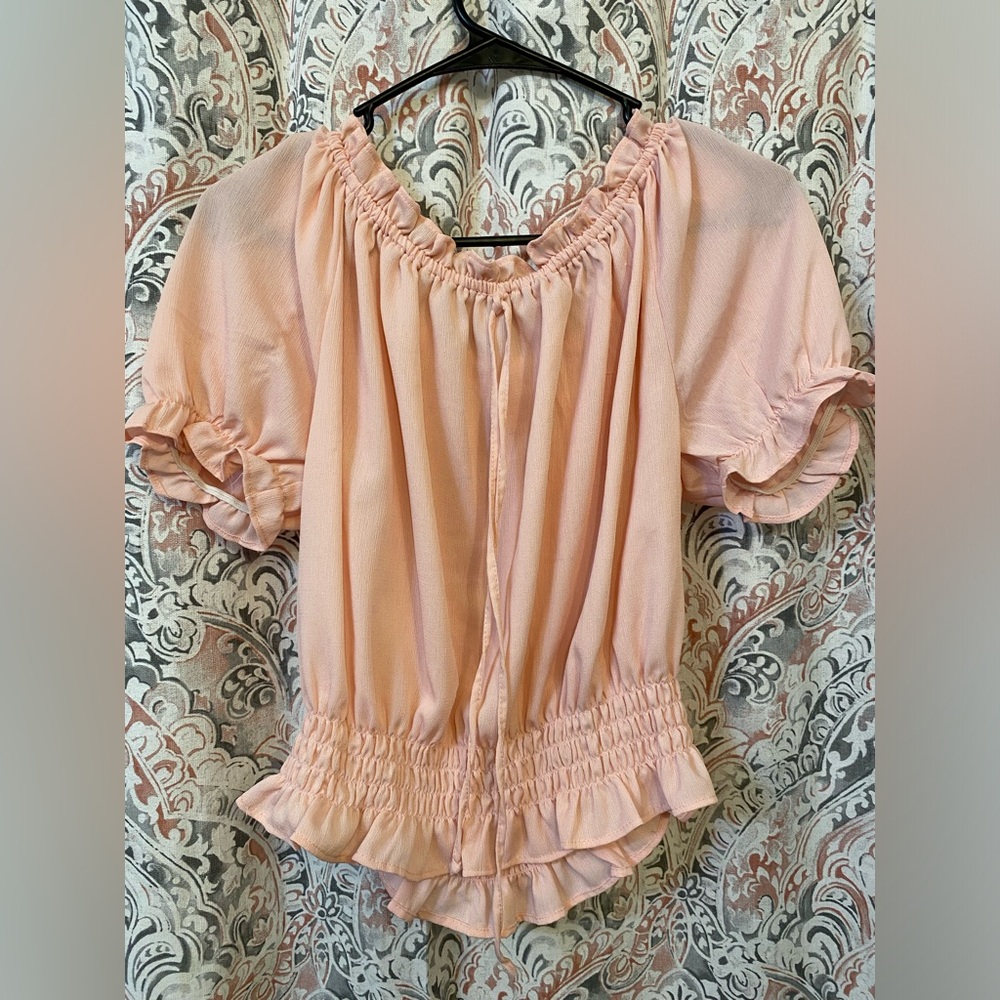 Pink off the shoulder ruffle shirt
